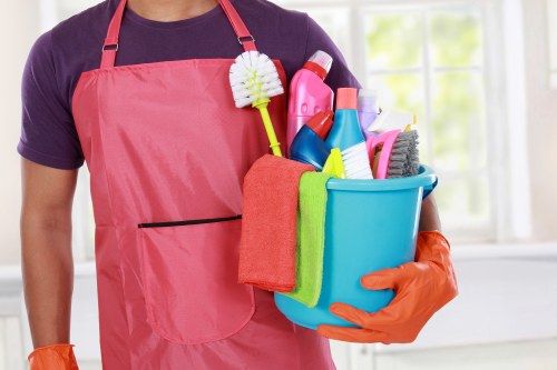 Team member completing a safe cleaning setup in a Finsbury Park property